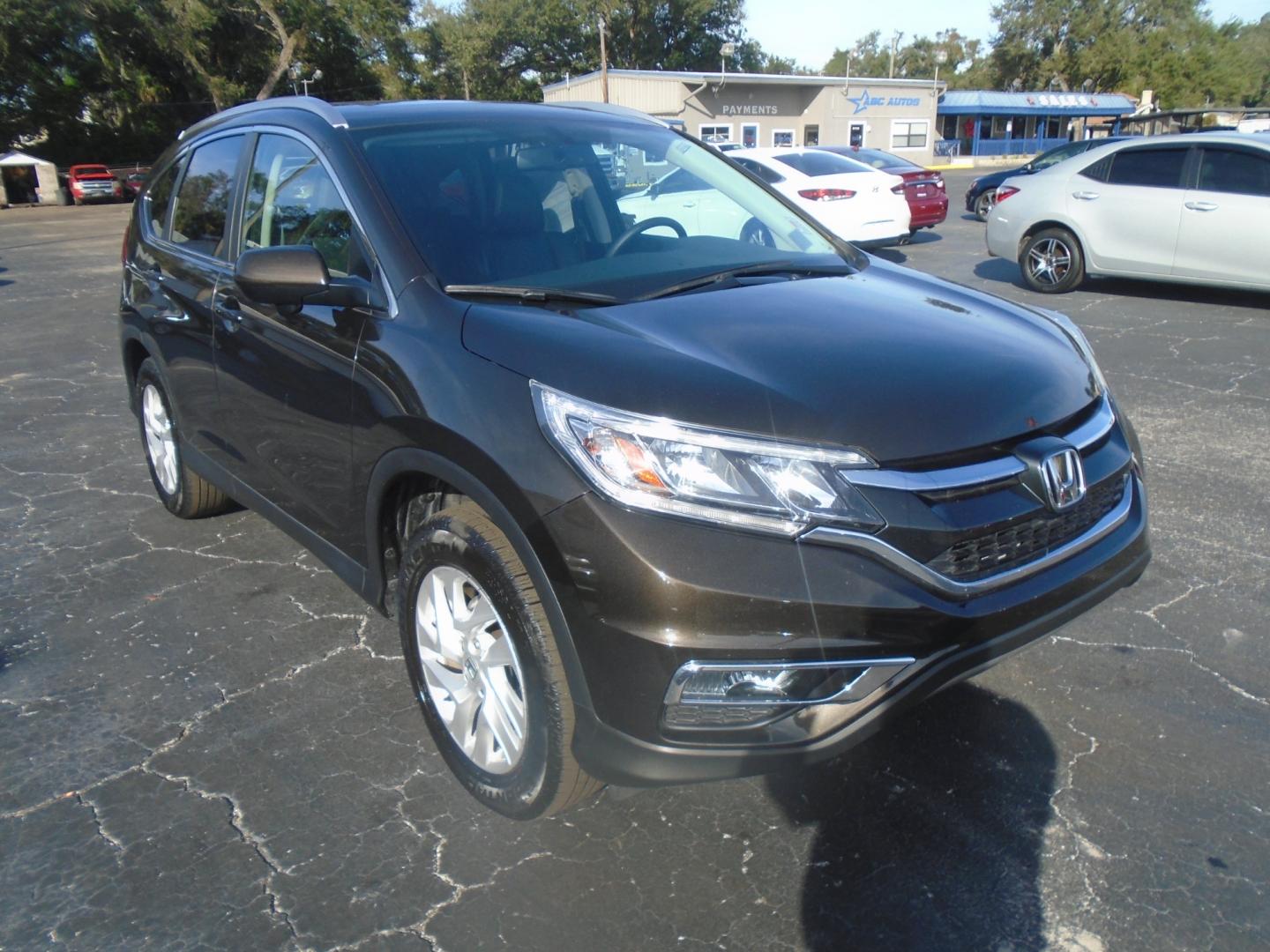 2015 Honda CR-V (2HKRM3H74FH) , located at 6112 N Florida Avenue, Tampa, FL, 33604, (888) 521-5131, 27.954929, -82.459534 - Photo#2